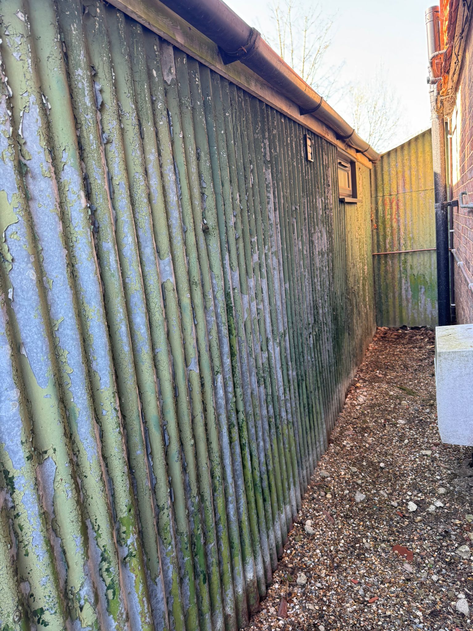 Outbuilding exterior repaint - Before